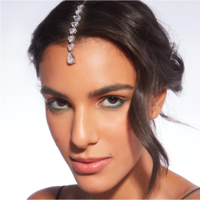 model wearing a crystal mangtika by Isharya