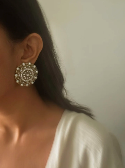 model wearing Dohra earring studs