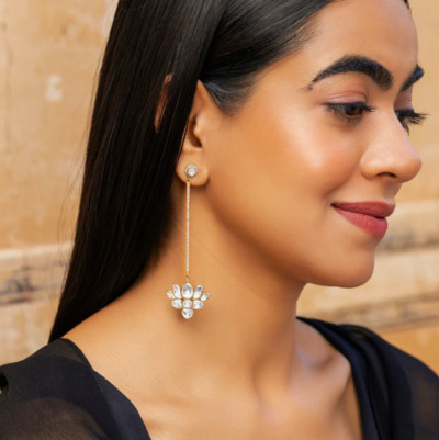 model wearing kesya earrings