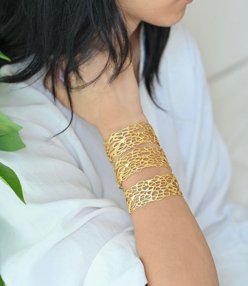 gold statement cuffs by Eurumme