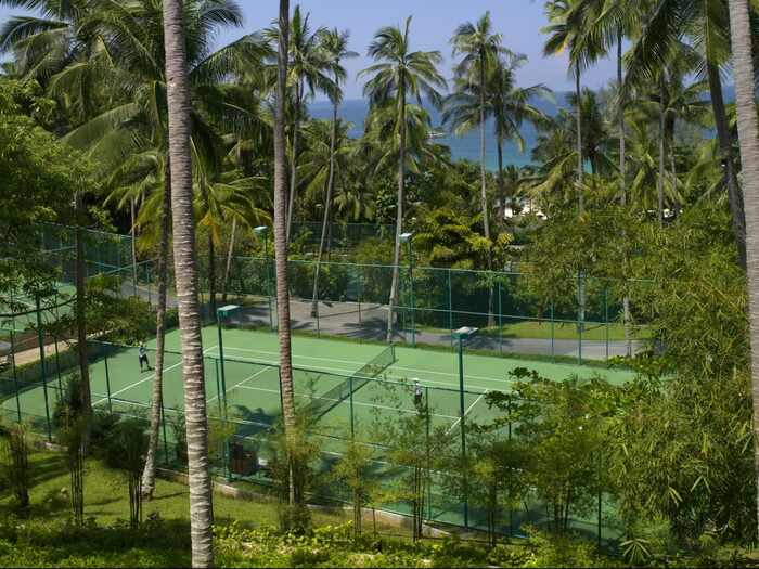 Scenic hotel tennis courts - amanpuri phuket tennis court